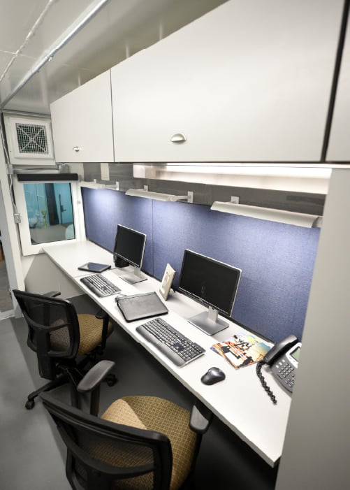 This HATS office building features several workstations and is forced-entry-resistant