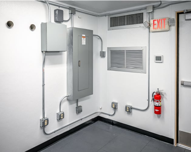 Interior of a modular blast-resistant control room designed for secure mission-critical occupancy